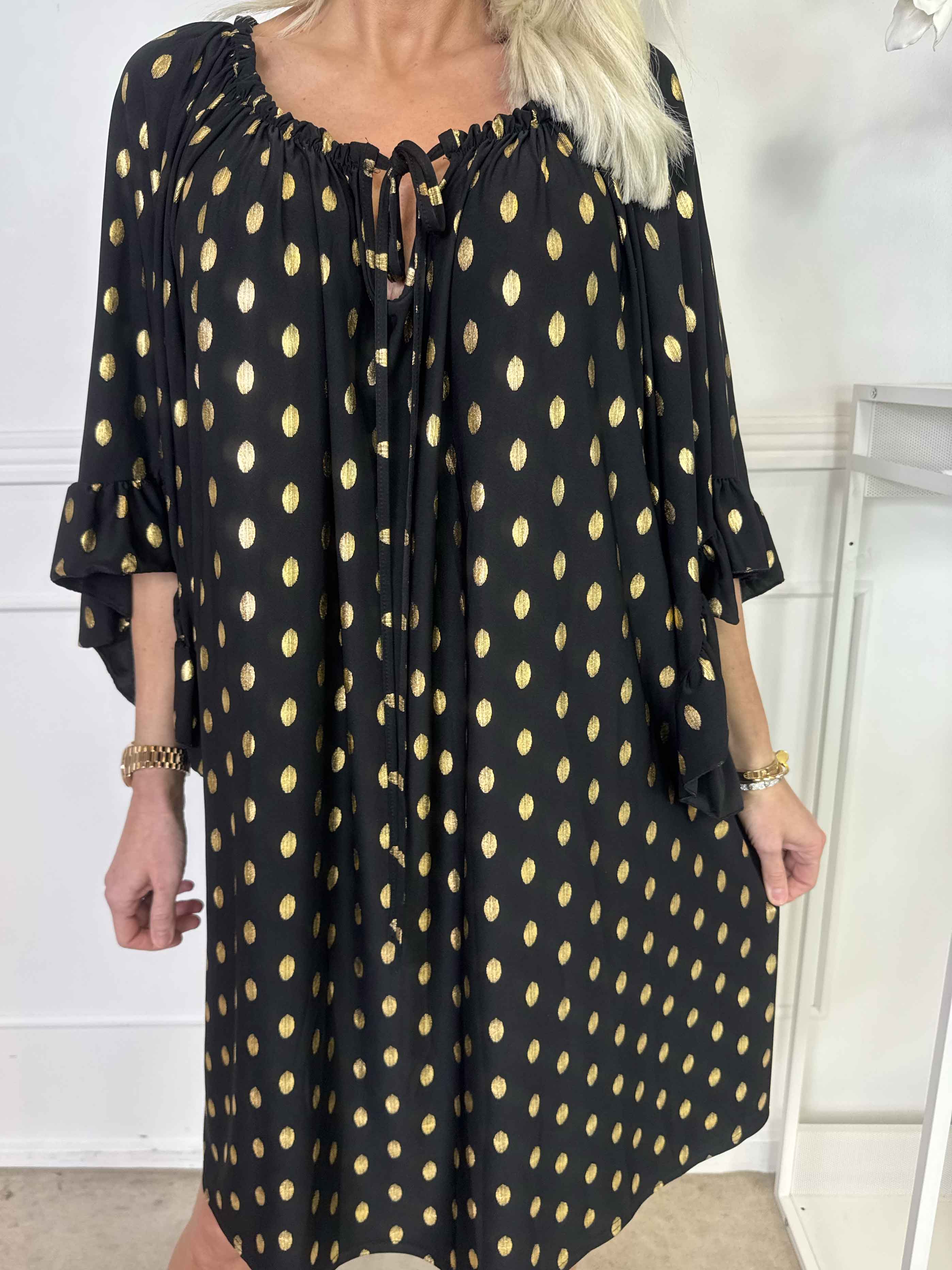 Yasma - Elastisk tunikaklänning med guldprickar och volangärmar